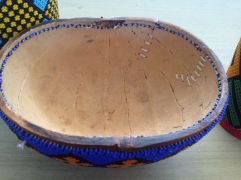 Inside of the gourd bowl. Stitches because it was broken in transit.